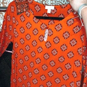 Red patterned dress!